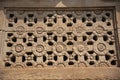 Ornately sculpted windows of temples in Aihole in Karnataka, India Royalty Free Stock Photo