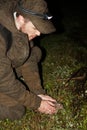 Ornithologist holding the eurasian Woodcock in hands