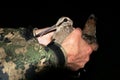 Ornithologist holding the eurasian Woodcock in hands