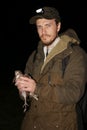 Ornithologist holding the eurasian Woodcock in hands