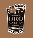 Oro Valley on a brown background
