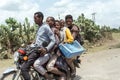 Ordinary people, family travel on bike in Ethiopian countryside