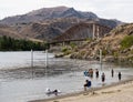 People swimming at Beebe Bridge Park beach in summer