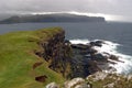 Oronsay with squally shower coming in Royalty Free Stock Photo