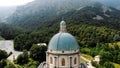 OROPA, BIELLA, ITALY - JULY 7, 2018: aero View of beautiful Shrine of Oropa, Facade with dome of the Oropa sanctuary Royalty Free Stock Photo