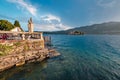 View of a building on Lake Orta with the Island of San Giulio in the background