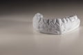 Dental health concept. Orthodontics. Plaster copy of the jaw of a person.