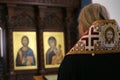 Orthodox bishop is praying in front of altar Royalty Free Stock Photo