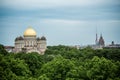 Orthodox Cathedral golden dome above Riga city trees.