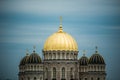 Orthodox Cathedral golden dome above Riga city trees. Royalty Free Stock Photo