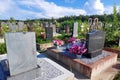 Orthodox cemetery. Graves with crosses, tombstones. Clear sunny weather. Royalty Free Stock Photo