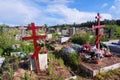 Orthodox cemetery. Graves with crosses, tombstones. Clear sunny weather. Royalty Free Stock Photo