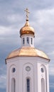 Orthodox chapel church with a golden dome against a stormy sky in Russia Royalty Free Stock Photo