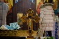 Orthodox Christian cross with money donations