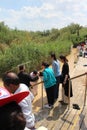 Orthodox Christian pilgrims as a part of a traditional baptism ceremony in the Jordan River Royalty Free Stock Photo