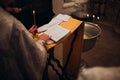 Orthodox Christian Priest and Holy Bible in the church. Epiphany ceremony rite. Royalty Free Stock Photo