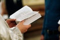 Orthodox Christian Priest and Holy Bible in the church. Epiphany ceremony rite. Royalty Free Stock Photo