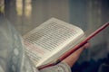 Orthodox christian priest reading church book