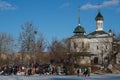 Orthodox Christians dive into the river in winter near the temple