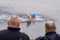Orthodox Christians swimming for the Holy Cross in the icy cold water