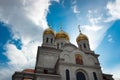 Orthodox Church on a background of blue sky with clouds. Royalty Free Stock Photo