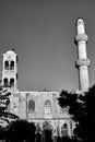 Orthodox church with a bell tower and a minaret in the town of Chania on the island of Crete Royalty Free Stock Photo