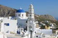 Orthodox church and bell tower in Pyrgos, Santorini, Greece. Royalty Free Stock Photo