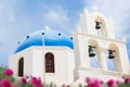 Orthodox church with blue dome in Oia on Santorini island, Greece Royalty Free Stock Photo