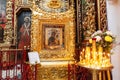 Orthodox Church. Christianity. Festive interior decoration with burning candles and icon in traditional Orthodox Church on Easter