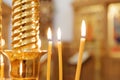 Orthodox Church. Christianity. Festive interior decoration with burning candles and icon in traditional Orthodox Church on Easter