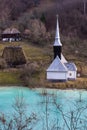 Orthodox church and drowned cemetery. Waste lake with cyanide po