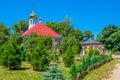 Orthodox Church with Golden domes in green trees Royalty Free Stock Photo