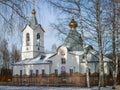 Orthodox Church in the Kaluga region among birch trees in winter. Royalty Free Stock Photo