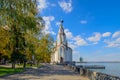 Orthodox church on the river bank in the city of Dnieper against the blue sky