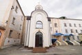 An orthodox church situated in the prison yard of Lukyanovskaya detention facility, bars on windows of cells