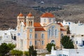 Orthodox church surrounded by marble houses in Pirgos of Tinos