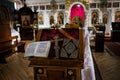 Orthodox Church wedding paraphernalia - a cross and a bible on the altar