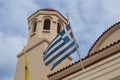 Orthodox churcha and a greek flag