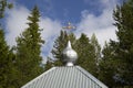 Orthodox cross on the dome of the church against the blue sky Royalty Free Stock Photo