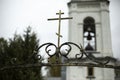 Orthodox cross. Entrance to temple. Forged cross made of steel