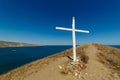 An Orthodox cross on top of a hill. Royalty Free Stock Photo