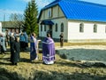 Orthodox divine service near the temple in the Kaluga region in Russia (2014).