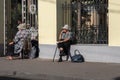 Orthodox elderly women wait outside a church in Tbilisi, Georgia,