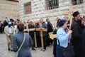 Orthodox Serbian Christians mark Good Friday in Jerusalem and carry wooden crosses in a procession along the Via Dolorosa.