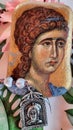 Orthodox prayer  with metal medaillonn Painted stone Archangel Gabriel icon Royalty Free Stock Photo