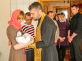 Orthodox infant baptism ceremony at home in Belarus.