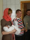 Orthodox infant baptism ceremony at home in Belarus.