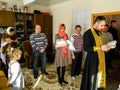 Orthodox infant baptism ceremony at home in Belarus.