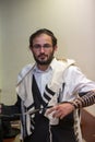 Orthodox cleans the place of tefillin after prayers Royalty Free Stock Photo