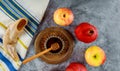 Orthodox Jewish holiday honey on the pomegranate and apples. Jewish new year Rosh Ha Shana shofar